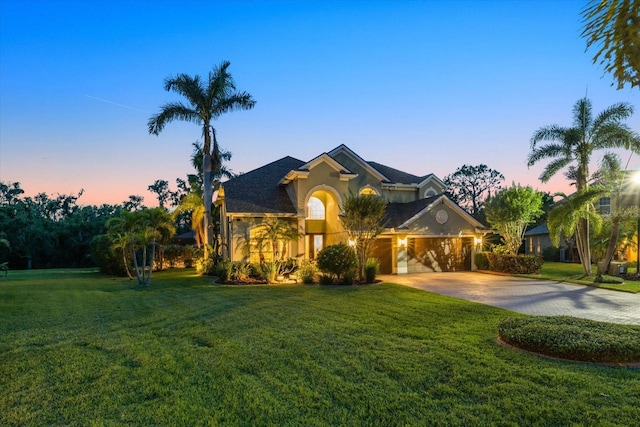 6907 47th Ct E, Ellenton, FL 34222 - view of front of home with driveway, stucco siding, and a front lawn