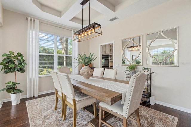 6907 47th Ct E, Ellenton, FL 34222 - dining area with coffered ceiling, a chandelier, baseboards, dark wood-style floors, and beamed ceiling