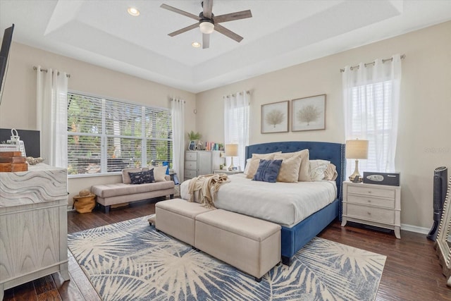 6907 47th Ct E, Ellenton, FL 34222 - bedroom with a tray ceiling, wood finished floors, recessed lighting, baseboards, and a ceiling fan