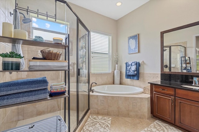 6907 47th Ct E, Ellenton, FL 34222 - full bath featuring a stall shower, tile patterned floors, a bath, and vanity