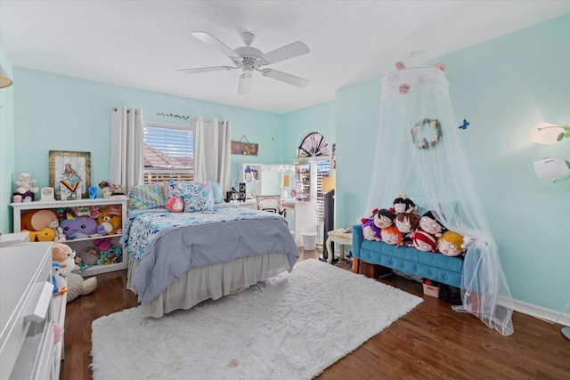 6907 47th Ct E, Ellenton, FL 34222 - bedroom with wood finished floors, baseboards, and ceiling fan