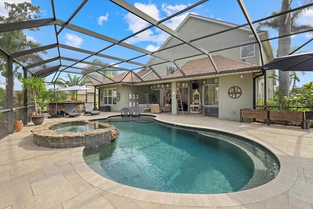 6907 47th Ct E, Ellenton, FL 34222 - view of pool featuring a patio area, a pool with connected hot tub, and a lanai