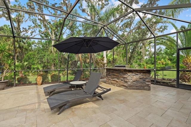 6907 47th Ct E, Ellenton, FL 34222 - view of patio / terrace featuring glass enclosure