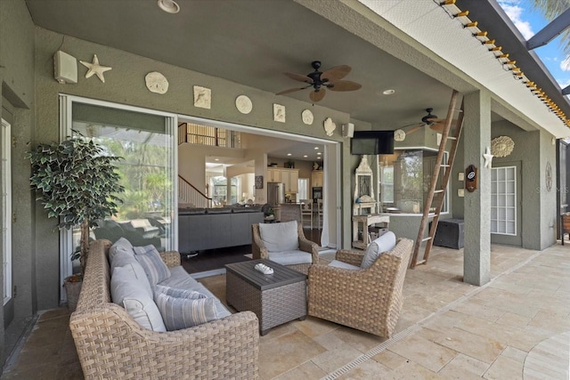 6907 47th Ct E, Ellenton, FL 34222 - view of patio with a ceiling fan and an outdoor living space