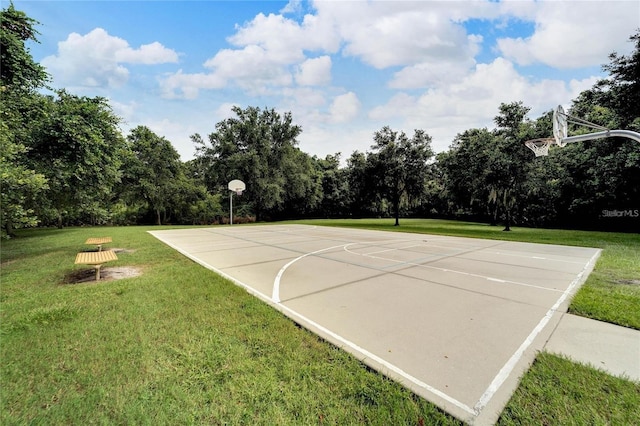 6907 47th Ct E, Ellenton, FL 34222 - view of basketball court featuring community basketball court, a yard, and view of wooded area