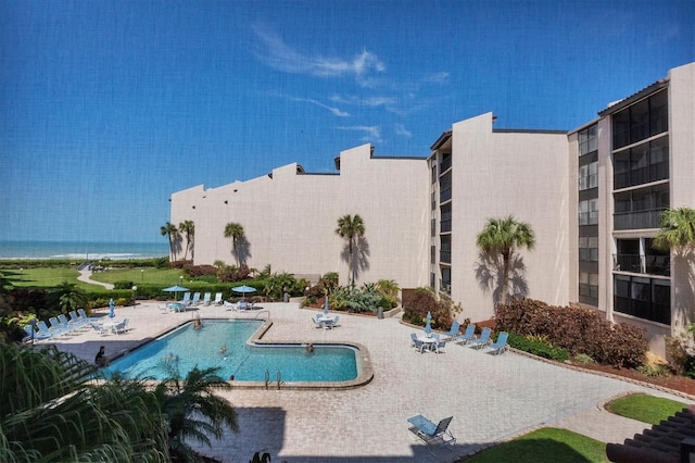 6480 Midnight Pass Rd Unit 311, Sarasota, FL 34242 - community pool with a patio area