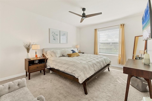 8628 Milestone Dr, Sarasota, FL 34238 - carpeted bedroom with baseboards and ceiling fan