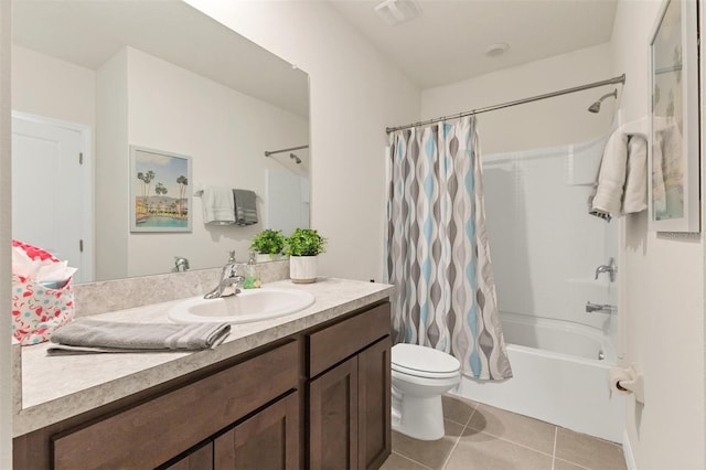 8628 Milestone Dr, Sarasota, FL 34238 - bathroom with tile patterned floors, toilet, shower / tub combo, and vanity