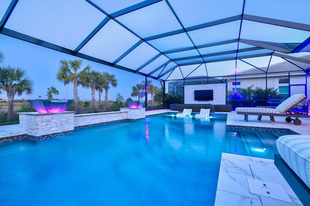 swimming pool featuring a patio area and a lanai