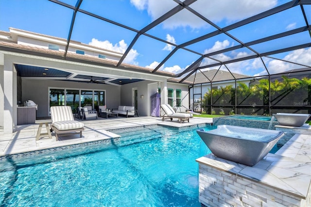 swimming pool with an outdoor living space, a patio, ceiling fan, and a lanai