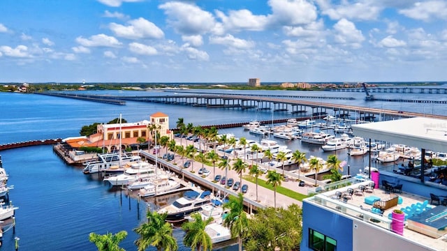aerial view of a notable bridge, a large body of water, and a marina