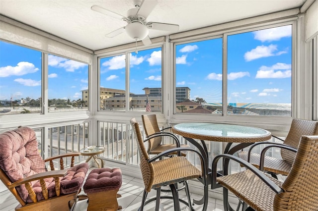 1255 Tarpon Center Dr Unit 309, Venice, FL 34285 - sunroom with tile patterned floors