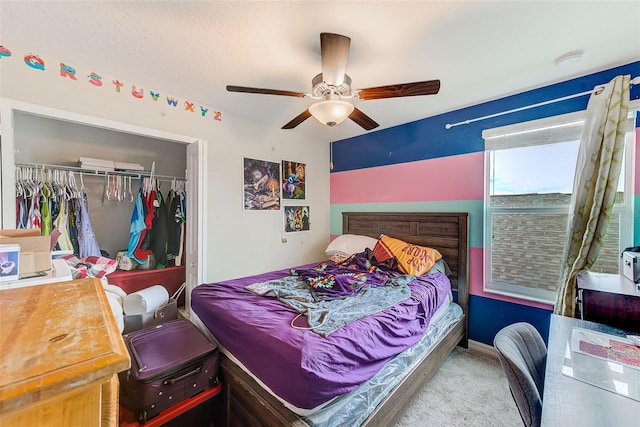 10944 Rainbow Pyrite Dr, Wimauma, FL 33598 - bedroom with carpet, a closet, and ceiling fan