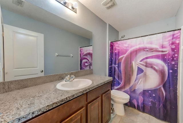 10944 Rainbow Pyrite Dr, Wimauma, FL 33598 - full bathroom with vanity, toilet, and tile patterned floors