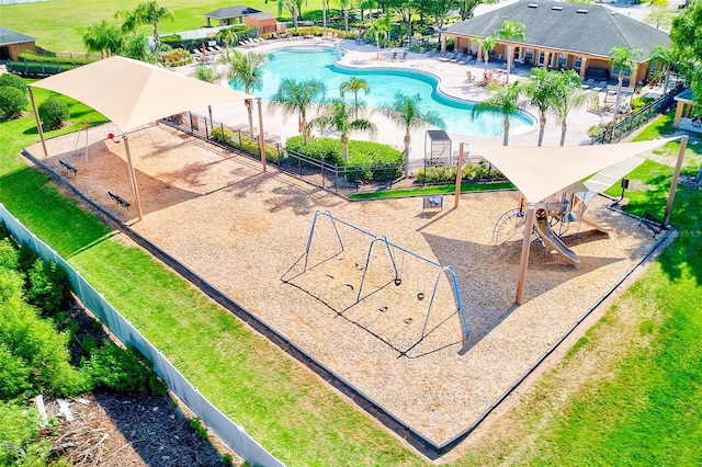 10944 Rainbow Pyrite Dr, Wimauma, FL 33598 - drone / aerial view of a pool area