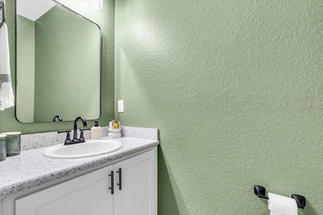 16411 62nd Gln E, Parrish, FL 34219 - bathroom with a textured wall and vanity
