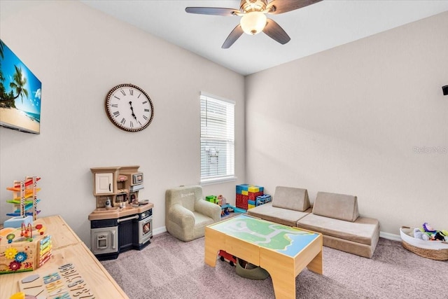 16411 62nd Gln E, Parrish, FL 34219 - living room featuring a ceiling fan, light colored carpet, and baseboards