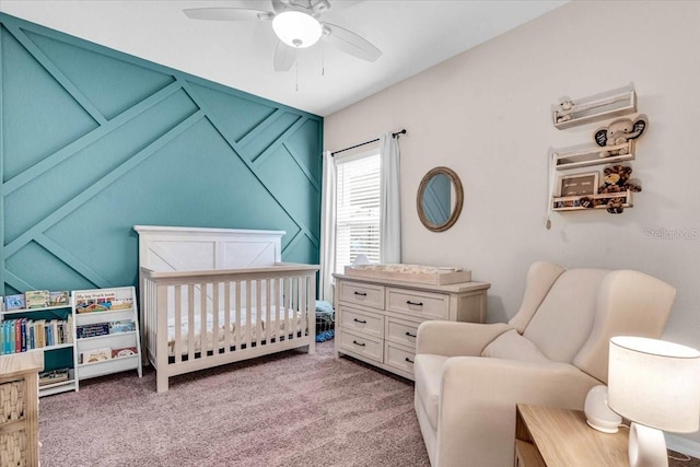 16411 62nd Gln E, Parrish, FL 34219 - bedroom with a crib, light carpet, and ceiling fan