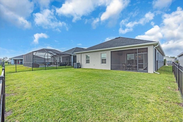 16411 62nd Gln E, Parrish, FL 34219 - rear view of property with a sunroom, stucco siding, and cooling unit