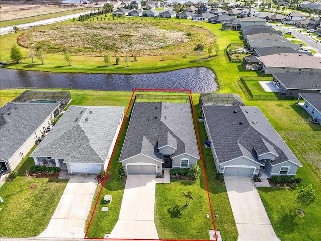 16411 62nd Gln E, Parrish, FL 34219 - aerial view of residential area with a nearby body of water and property parcel outlined