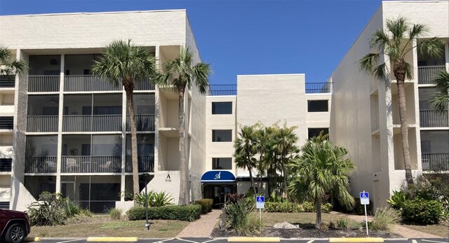 6124 43rd St W Unit 104A, Bradenton, FL 34210 - view of apartment building / complex with uncovered parking