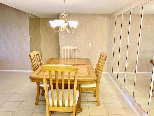 6124 43rd St W Unit 104A, Bradenton, FL 34210 - dining room with a chandelier, light tile patterned floors, and a textured ceiling