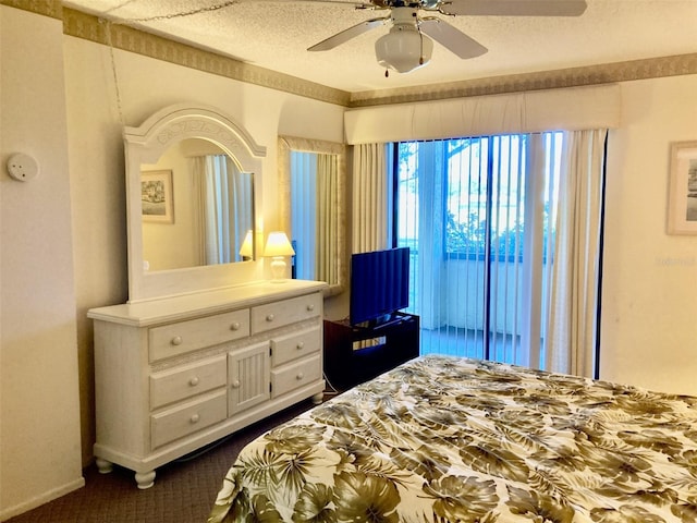 6124 43rd St W Unit 104A, Bradenton, FL 34210 - bedroom with dark carpet and ceiling fan