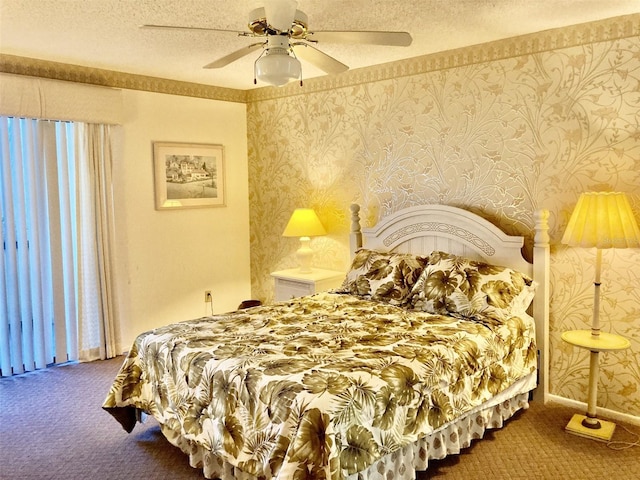 6124 43rd St W Unit 104A, Bradenton, FL 34210 - bedroom with carpet floors, wallpapered walls, a textured ceiling, and a ceiling fan