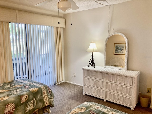 6124 43rd St W Unit 104A, Bradenton, FL 34210 - bedroom featuring dark carpet, ceiling fan, and baseboards