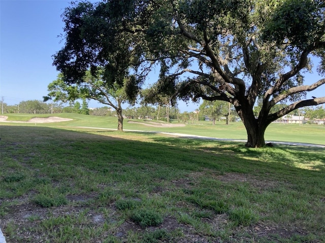 6124 43rd St W Unit 104A, Bradenton, FL 34210 - view of property's community featuring a yard and view of golf course