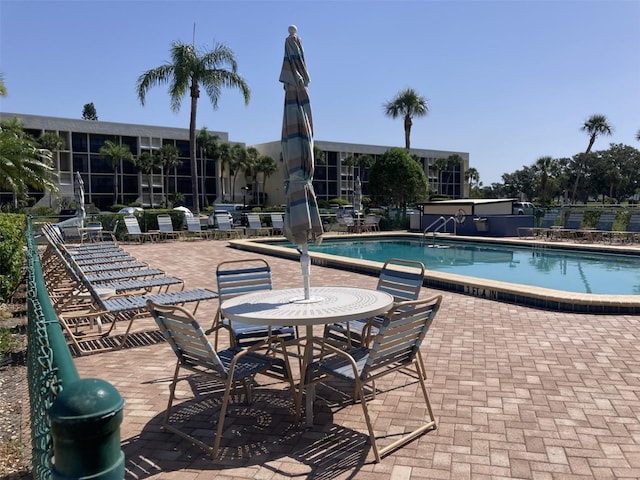 6124 43rd St W Unit 104A, Bradenton, FL 34210 - community pool with a patio