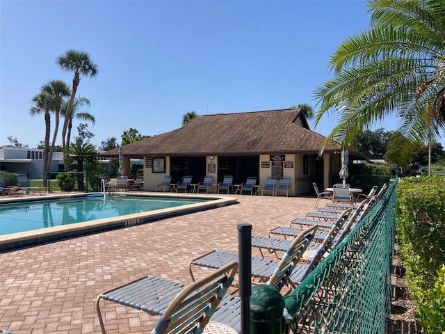 6124 43rd St W Unit 104A, Bradenton, FL 34210 - community pool with fence and a patio area