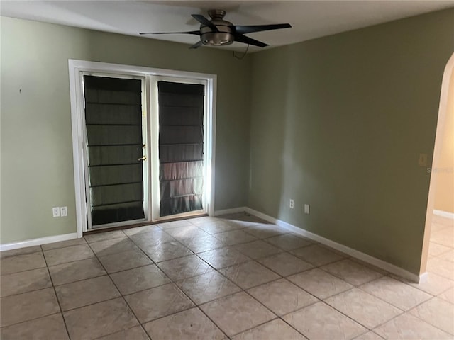116 Wild Holly Ln, Longwood, FL 32779 - empty room featuring light tile patterned floors, a ceiling fan, and baseboards