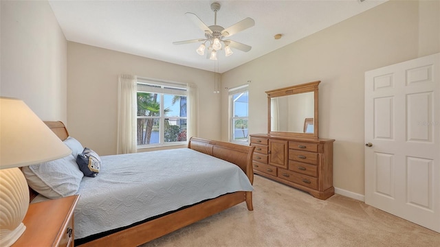 4274 Tennyson Way, Venice, FL 34293 - bedroom featuring light carpet, baseboards, and ceiling fan