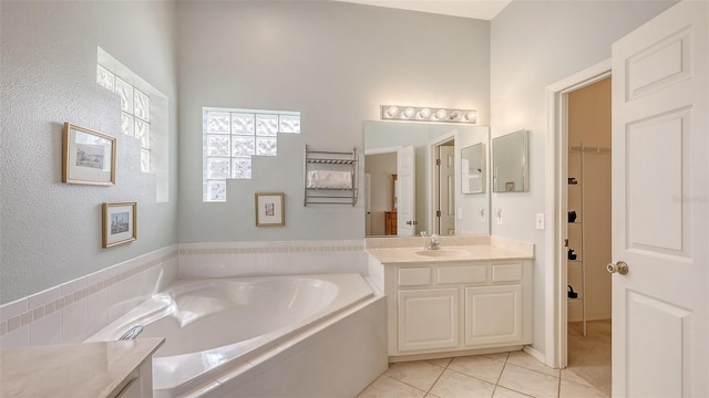 4274 Tennyson Way, Venice, FL 34293 - full bathroom with tile patterned floors, a garden tub, and vanity