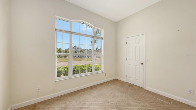 4274 Tennyson Way, Venice, FL 34293 - unfurnished room featuring plenty of natural light, carpet flooring, and baseboards