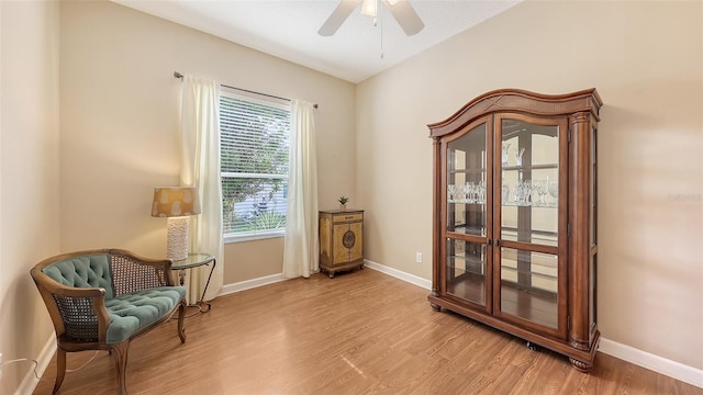 4274 Tennyson Way, Venice, FL 34293 - living area featuring light wood-style floors, baseboards, and ceiling fan