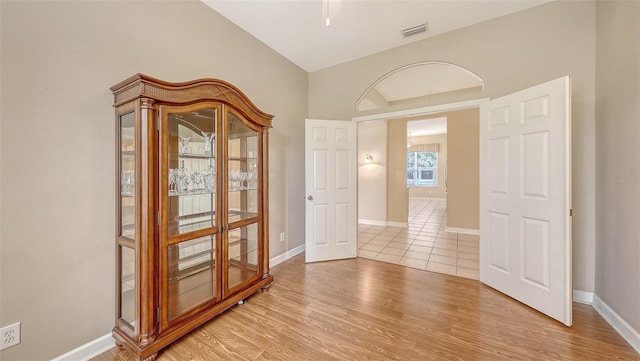 4274 Tennyson Way, Venice, FL 34293 - spare room featuring baseboards and light wood-style floors