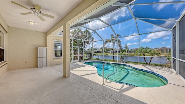 4274 Tennyson Way, Venice, FL 34293 - outdoor pool featuring a water view, ceiling fan, a patio, and a lanai