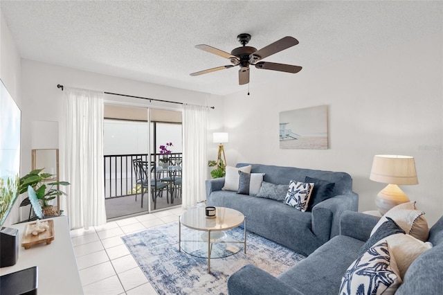 5681 Midnight Pass Rd Unit 104, Sarasota, FL 34242 - tiled living area with a ceiling fan and a textured ceiling