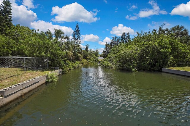 7308 Maryland Ave, Hudson, FL 34667 - dock featuring fence and a water view