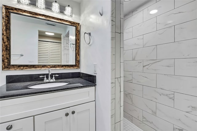 7308 Maryland Ave, Hudson, FL 34667 - full bath with vanity and a tile shower