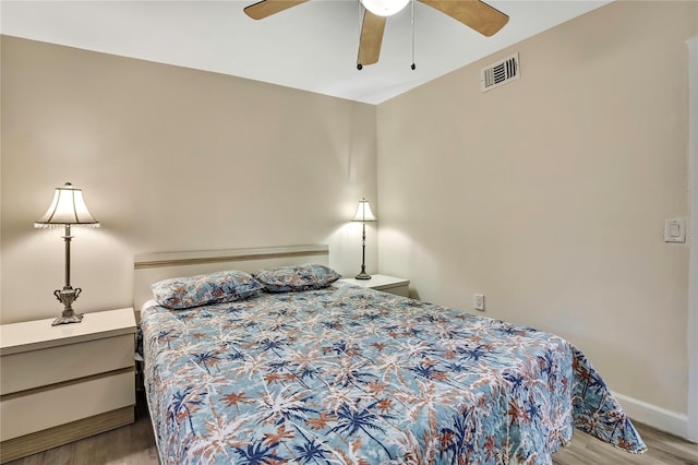 7308 Maryland Ave, Hudson, FL 34667 - bedroom featuring wood finished floors, baseboards, and a ceiling fan