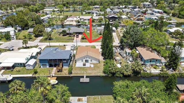 7308 Maryland Ave, Hudson, FL 34667 - aerial view of property and surrounding area featuring nearby suburban area and a large body of water
