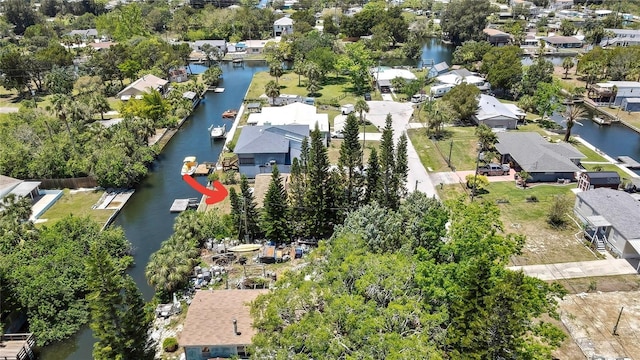 7308 Maryland Ave, Hudson, FL 34667 - aerial view of residential area with a large body of water