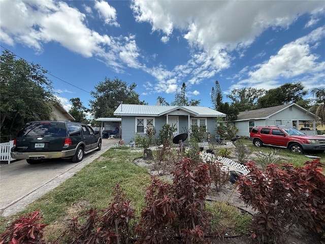 1113 23rd Ave W, Bradenton, FL 34205 - view of front facade featuring metal roof