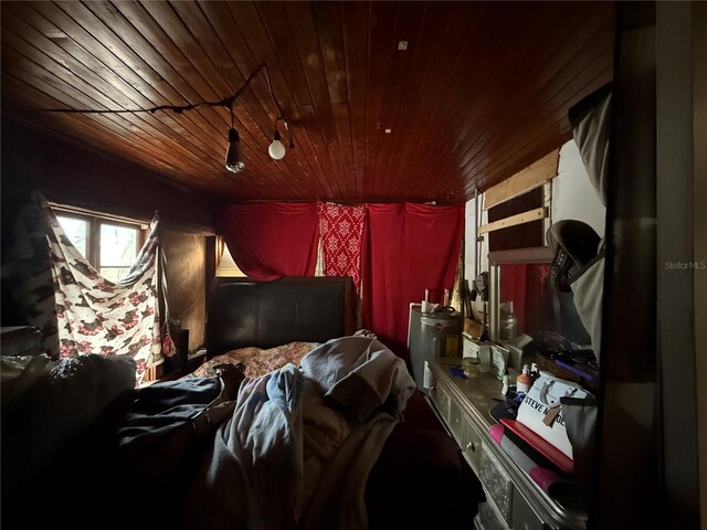 1113 23rd Ave W, Bradenton, FL 34205 - bedroom featuring wooden ceiling and refrigerator