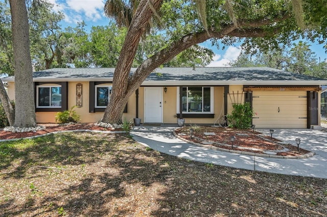 4468 Maraldo Ave, North Port, FL 34287 - ranch-style home featuring stucco siding, a garage, and driveway