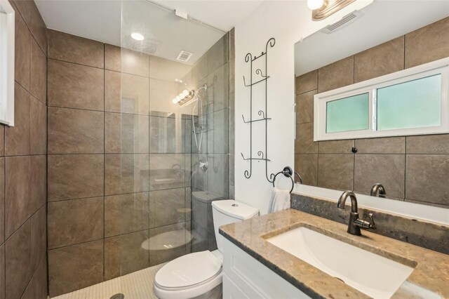4468 Maraldo Ave, North Port, FL 34287 - full bathroom with toilet, tiled shower, and vanity