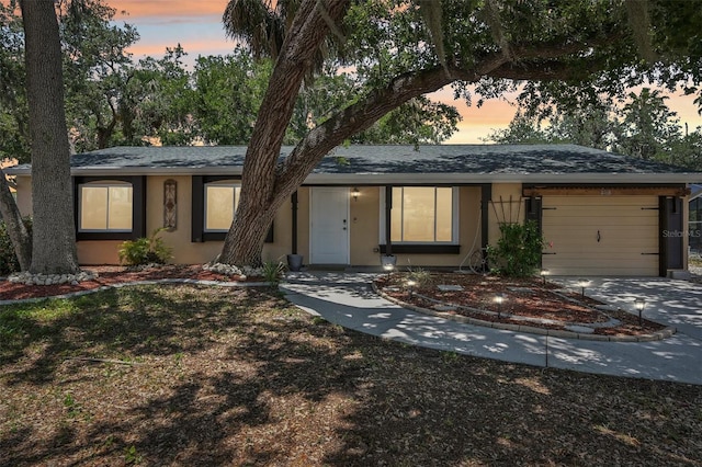 4468 Maraldo Ave, North Port, FL 34287 - ranch-style house featuring an attached garage, driveway, stucco siding, and a shingled roof